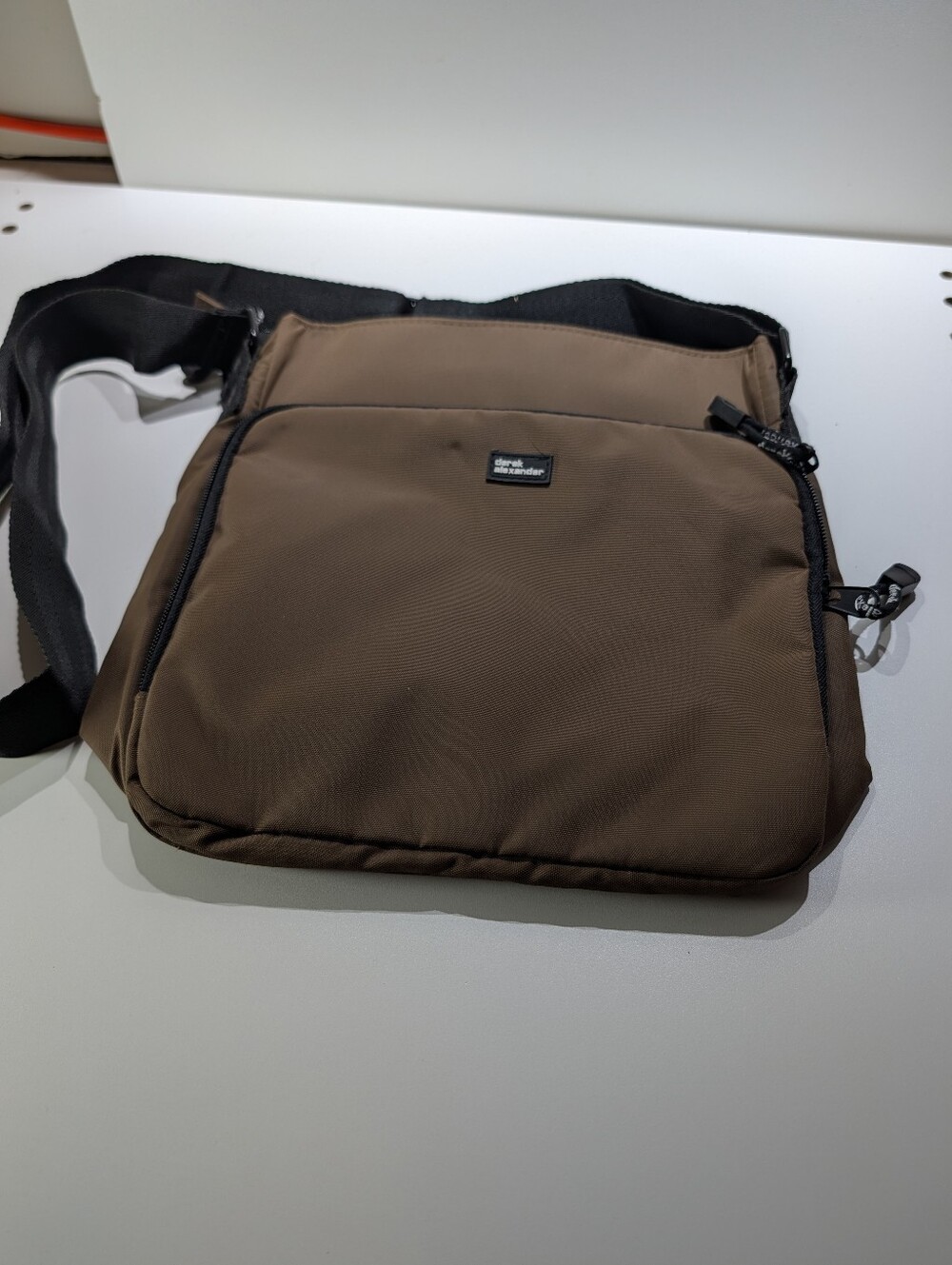 Derek Alexander vinyl crossbody